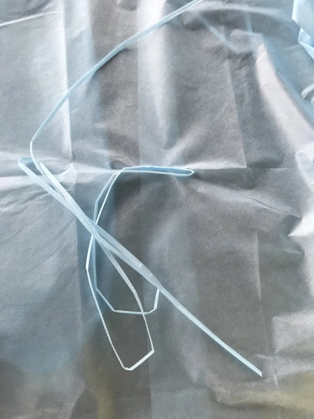 Level 1234 SMS with PE Film Disposable Surgical Isolation Gown Applied to Clinic Ward Lab with Non-Sterile